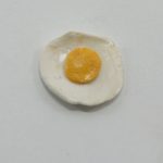 Bolsa de huevos fritos 3 und. Medidas: 1,5 cm.